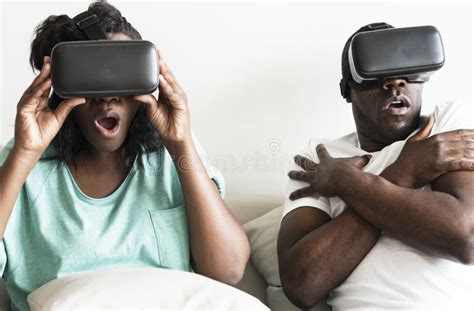 Couple Experiencing Virtual Reality With Vr Headset Stock Image Image