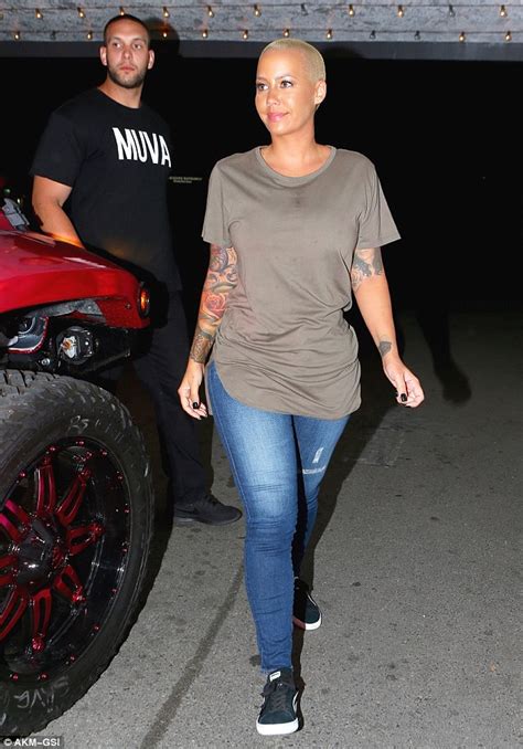 amber rose flashes a smile after news of blac chyna s engagement daily mail online