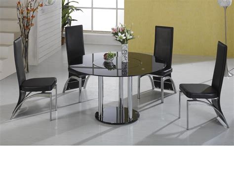 Lazy Susan Round Black Glass Dining Table And 4 Black Faux Chairs