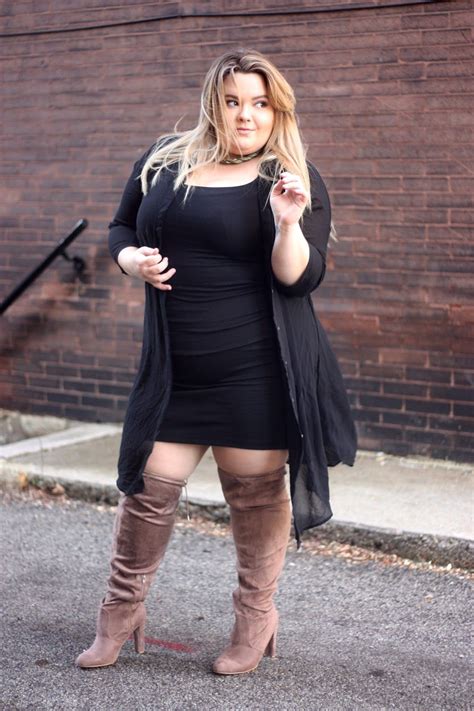 these thigh high boots from fashion to figure fit wide calfs and thighs perfect for a plus size