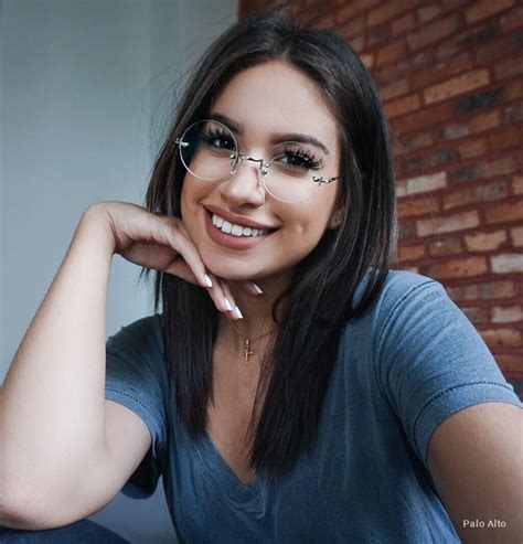 woman wearing round rimless glasses with images rimless glasses