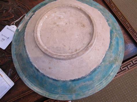 bonhams a group of kashan monochrome pottery persia 12th century