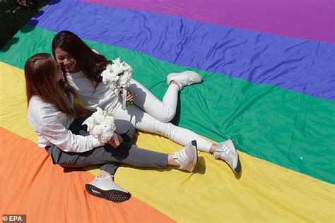 taiwan hosts asia s first ever legal gay marriage as a dozen same sex couples proudly say i do