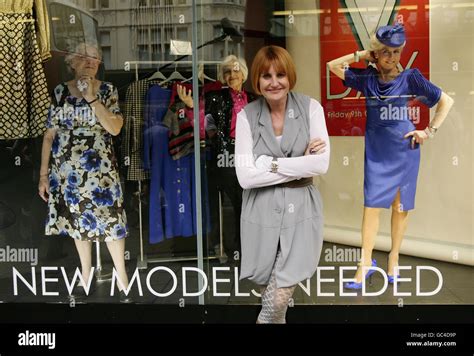 Front Poses With Charity Shop Workers Brenda Dean Left Hi Res Stock