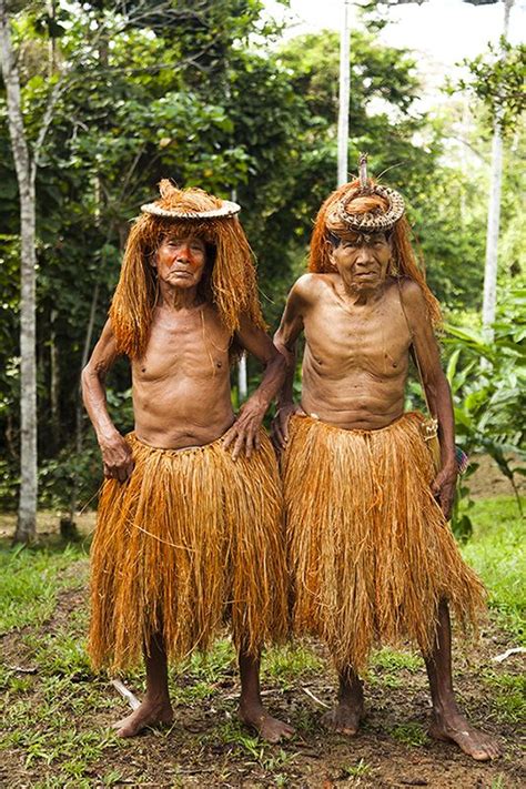 Elders From The Yagua Tribe In Traditional Dress The