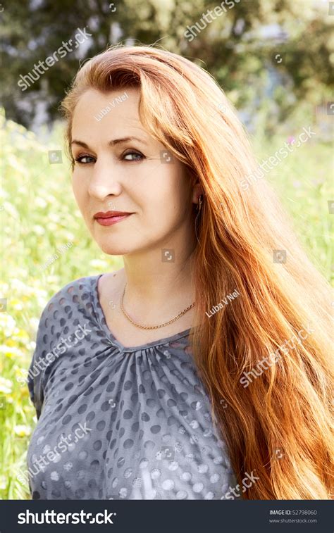 Pretty Middle Aged Casual Woman With Natural Color Long