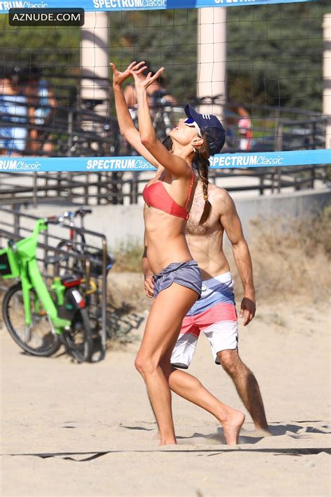 alessandra ambrosio in a red bikini while out playing