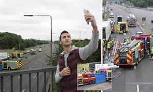 man at a406 crash scene is caught taking a selfie on his iphone daily mail online