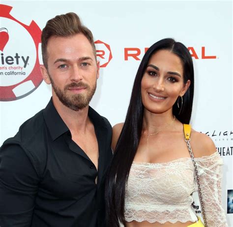 nikki bella says she might not take artem s name because she can t