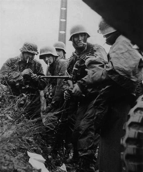 Nummers Weary Soldiers Of The Waffen Ss Taking A Brief Pause For A