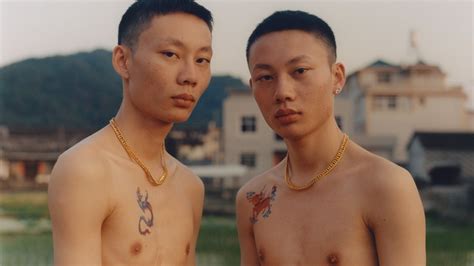 portraits of chinese twins recreating their most intimate