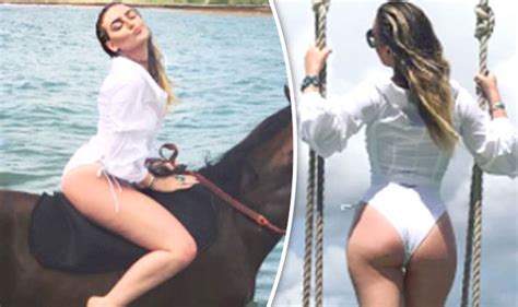 little mix s perrie edwards thrills fans as she teases bare bottom in sizzling swimsuit