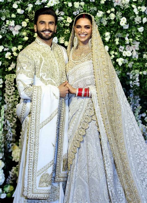 deepika padukone ranveer singh wedding reception couple  regal  white  gold colour