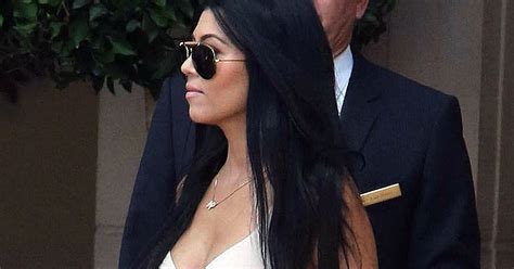 kourtney kardashian flashes major cleavage in plunging nude top