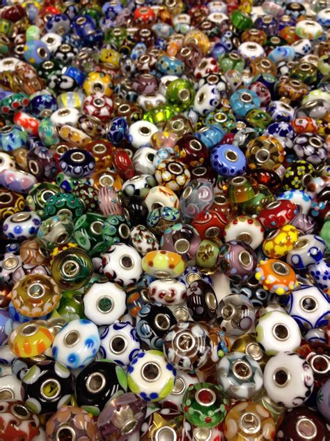 there is something so beautiful about glass trollbeads so much colour and you can see the care