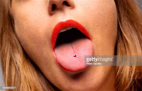 Female Sticking Out Tongue Close Up Bildbanksfoton Och Bilder Getty