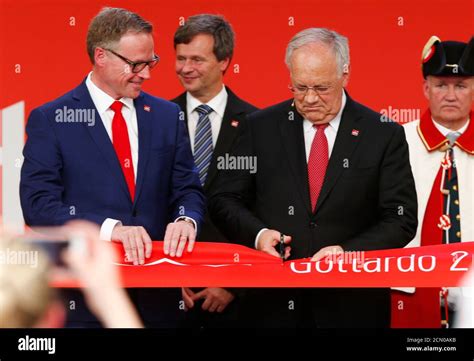 swiss president johann schneider ammann cuts  ribbon   swiss federal railways sbb ceo