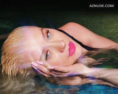 christina aguilera displays her tits while swimming in one
