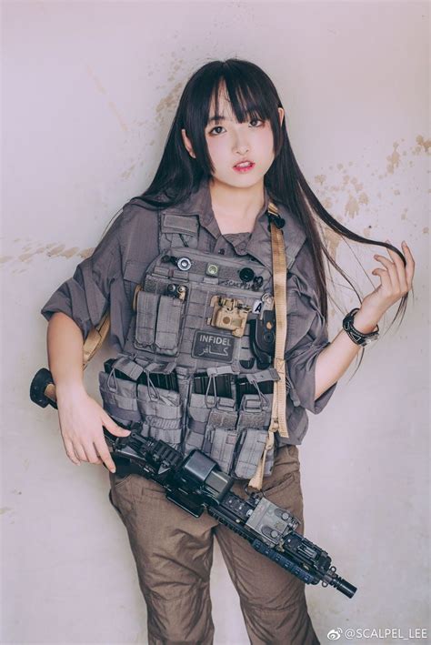 Pin On Sexy Asian Girls With Guns