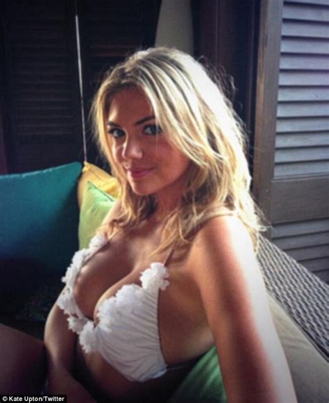 kate upton displays her 33dd cleavage as she tweets snaps from ocean side hotel in caribbean