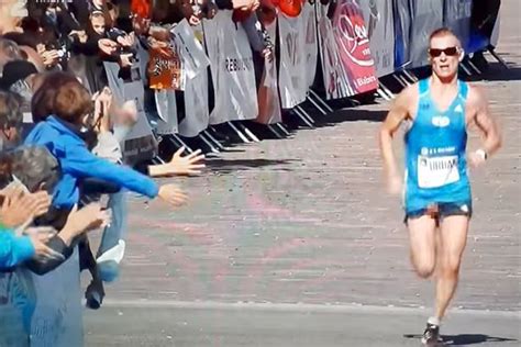 marathon runner s penis slips out of shorts as he reaches race end