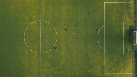 aerial view  football team practicing  day  soccer field  top view stock footage