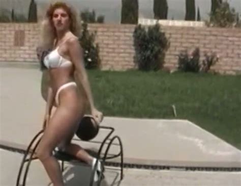 sassy bronze skin long legged blondie in white bikini video