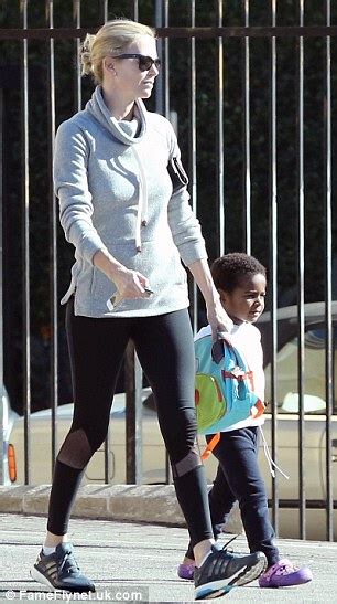 charlize theron wears jogging leggings as she picks up son jackson from karate class daily