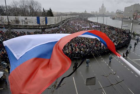 Remembering Slain Critic Of Putin Tens Of Thousands March In Moscow