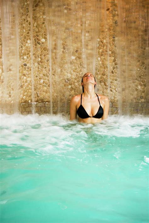 Woman Relaxing At A Spa In The Hot Tub Photograph By Corey Hendrickson