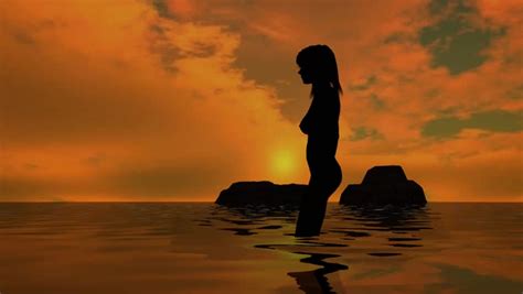 woman on the beach in sunset nude silhouette stock footage video