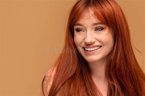 authentic cheerful ginger girl with beautiful smile natural freckles