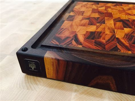 hand  walnut tigerwood cutting board  carolina wood designs