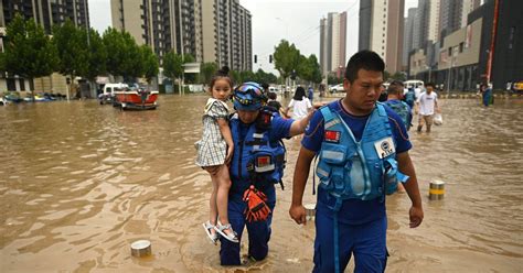 China Evacuates Tens Of Thousands As Storm Spreads North Death Toll Rises