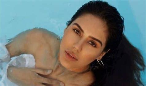 punjabi hotshot sonam bajwa looks scorching hot in white bikini as she