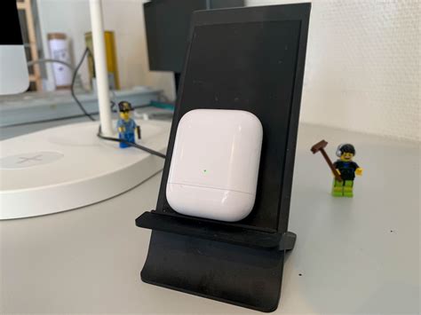 airpods op een verticale oplader met deze truc lukt het opladen