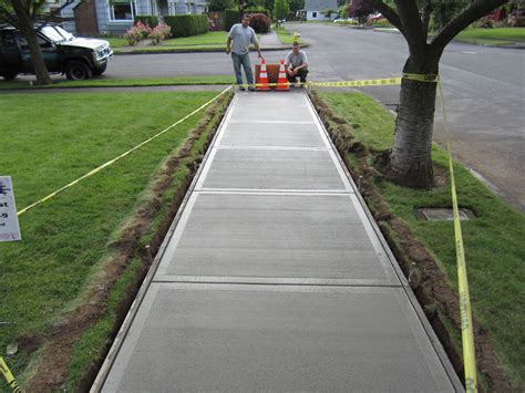 pour  concrete sidewalk concrete walkway concrete path cement patio