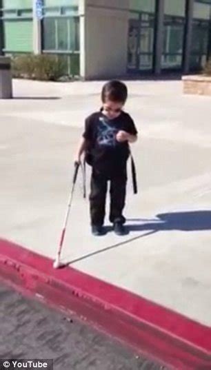 the heartwarming moment blind four year old steps off the kerb by himself for the first time