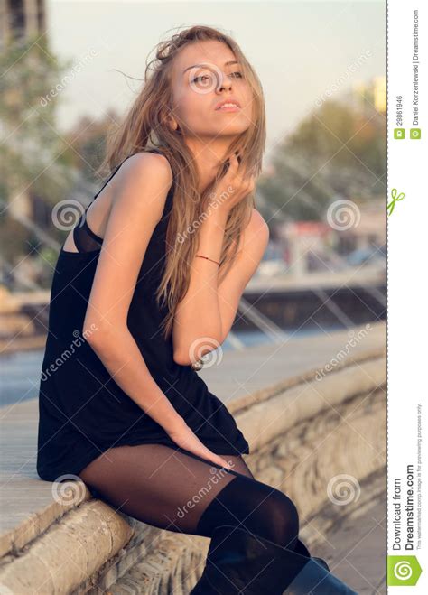 Sexy Woman In A Short Black Dress Royalty Free Stock Image