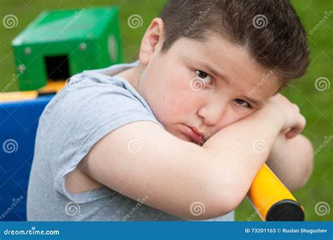 boy sad fat overweight exercise tired  portrait trainer