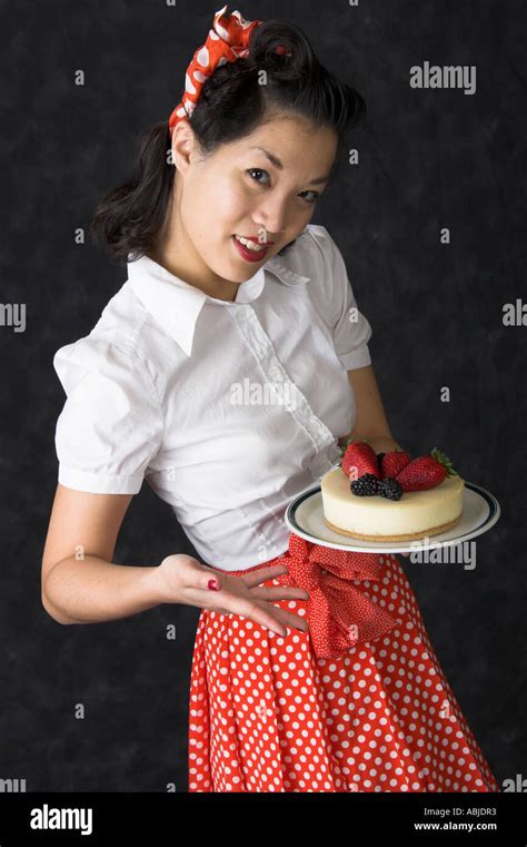 Marianne Cheesecake Chinese Girl Holding A Cheesecake Decorated With
