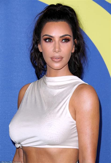 kim kardashian jokes she s always naked while accepting