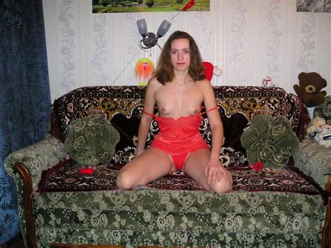 russian wife with small tits posing topless in red panties on sofa russian sexy girls