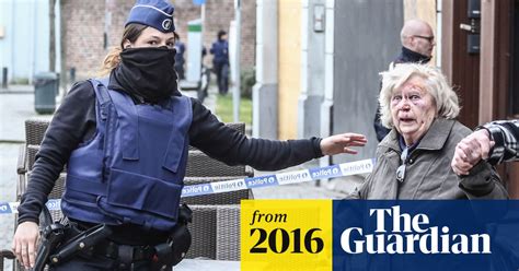 two suspects still on run after brussels anti terror raid that killed