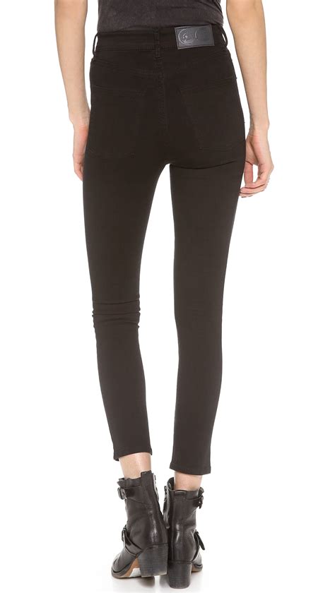 lyst cheap monday second skin jeans in black