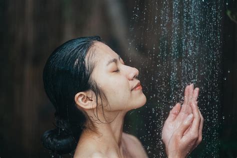 Premium Photo Beautiful Young Asian Woman Relaxing While Taking A Shower