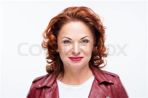 beautiful redhead mature woman smiling stock image colourbox