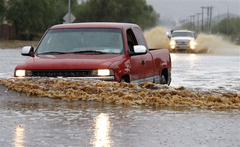 arizona flash floods leave freeways closed drivers stranded cbs news