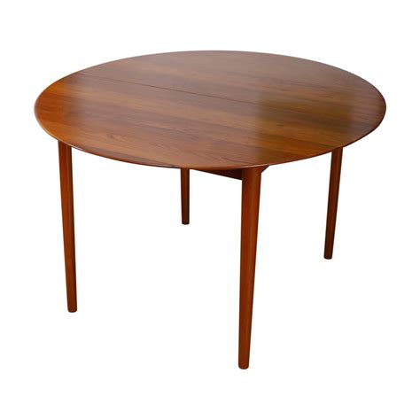 mid century solid teak model  circular extending dining table