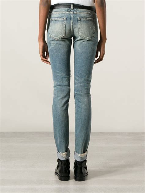 Lyst Saint Laurent Ripped Skinny Jeans In Blue